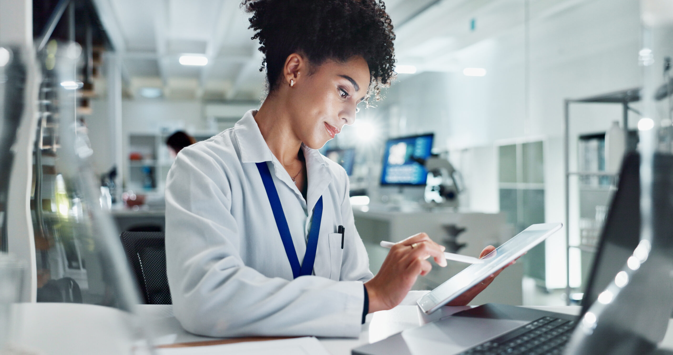 Woman, scientist and research with tablet for experiment results, medical study or exam on new discovery at lab. Female person or biologist working on technology for science, test or development.